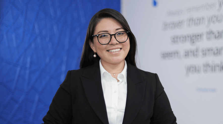 A woman smiling at the camera